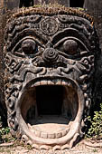 Vientiane , Laos. The Buddha Park (Xiang Khouan), giant pumpkin with a large open mouth serving as the entrance 